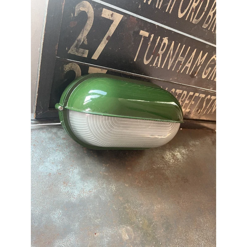 Outdoor industrial bulkhead wall lamp Oval weather-resistant design
