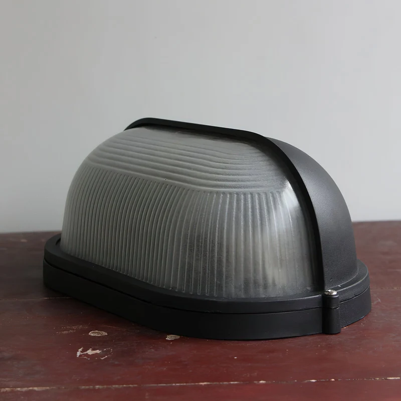 Outdoor industrial bulkhead wall lamp Oval weather-resistant design