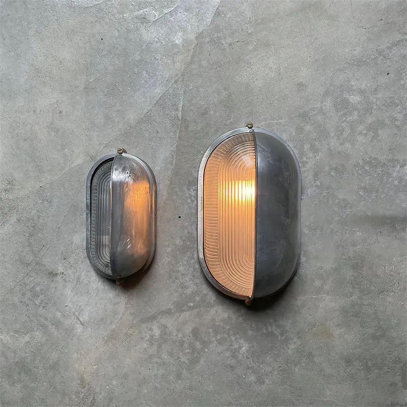 Outdoor industrial bulkhead wall lamp Oval weather-resistant design