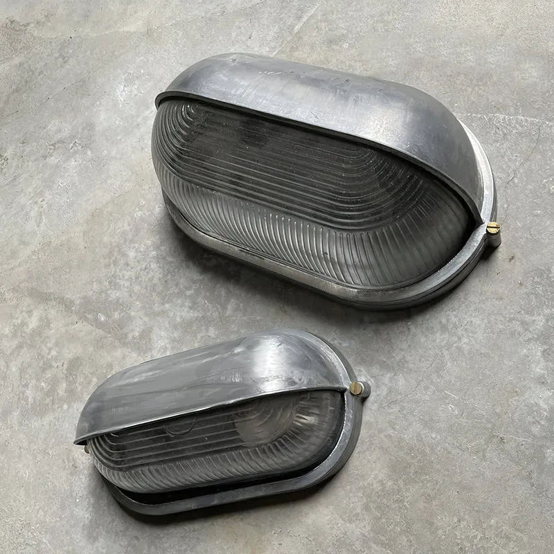 Outdoor industrial bulkhead wall lamp Oval weather-resistant design