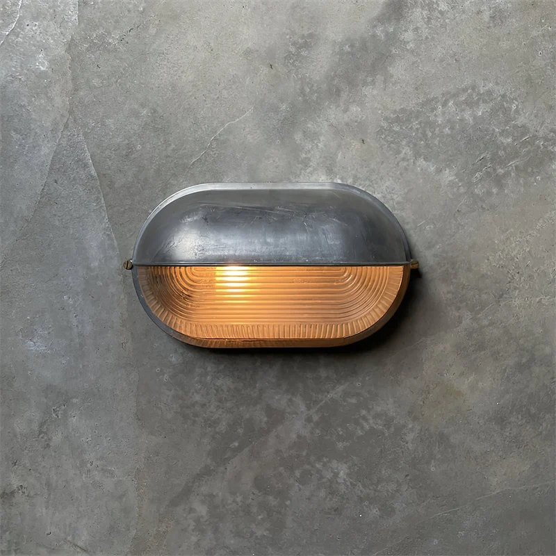 Outdoor industrial bulkhead wall lamp Oval weather-resistant design