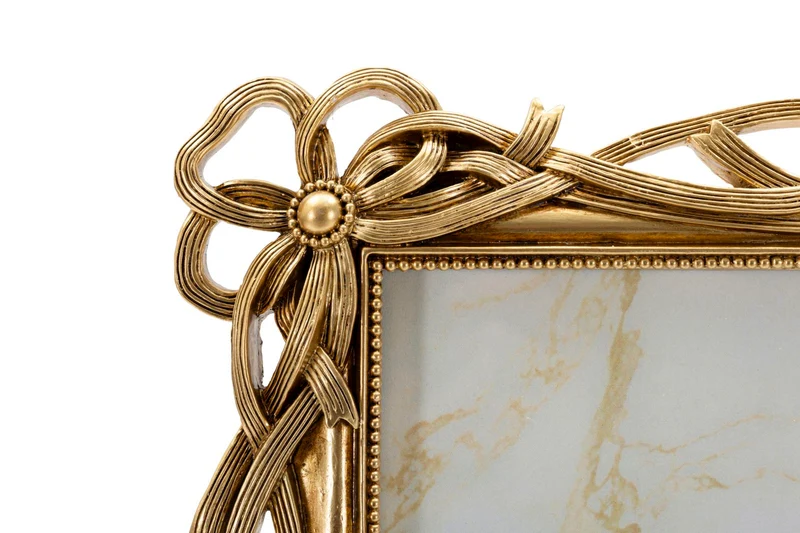 Cornice Knot 29x2,4x33,6 cm in Resina e Vetro Oro
