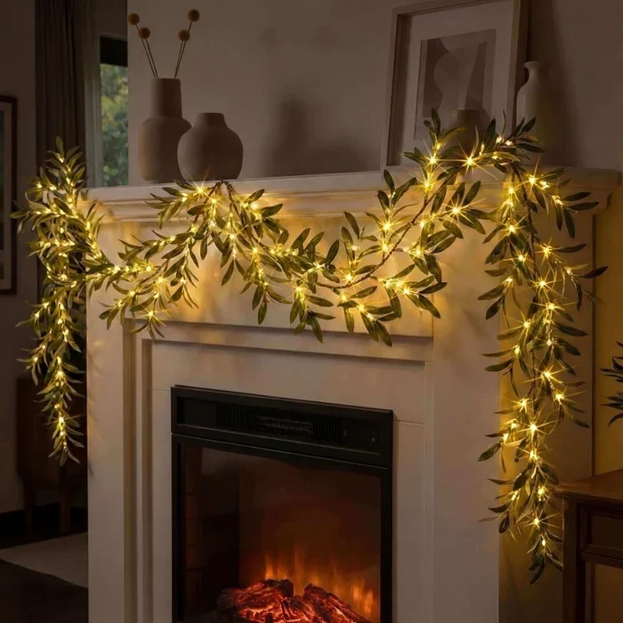 Verlichte olijftak – kunsttak met twinkelende lichtjes tussen de bladeren