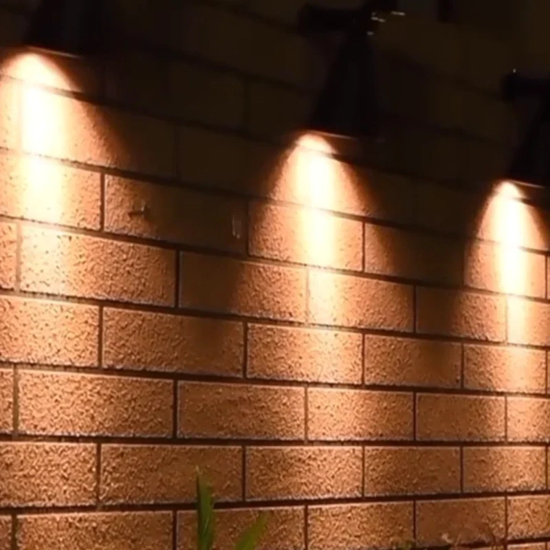 Adjustable solar-powered garden spotlight