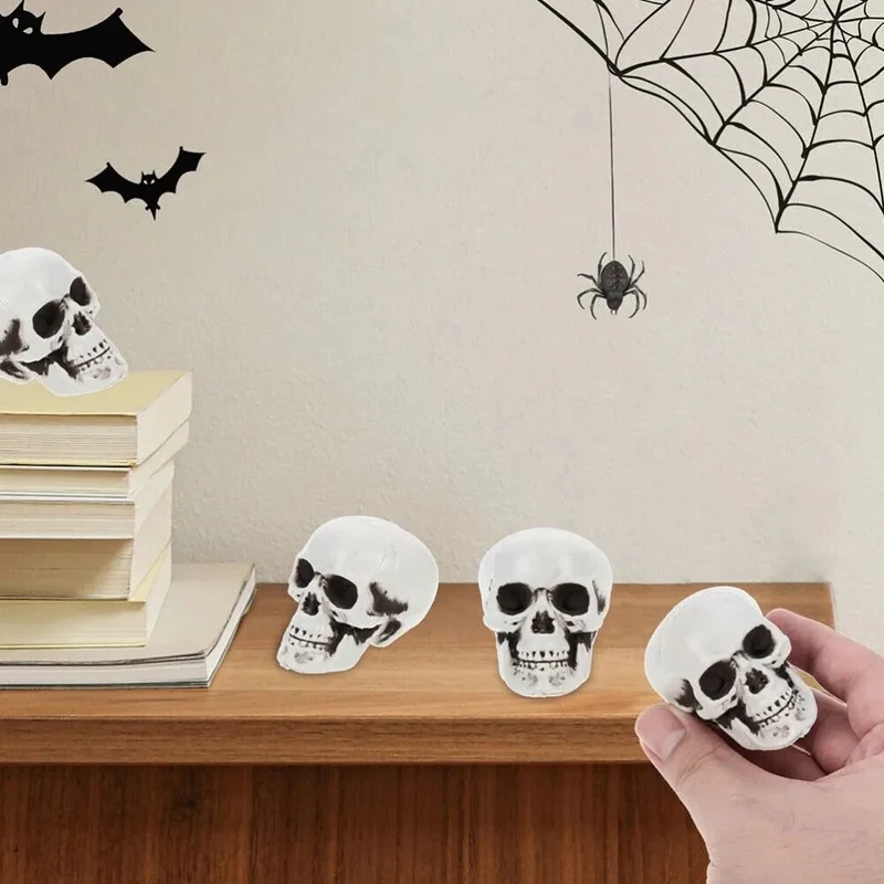 Halloween Home Décor Set of Miniature Plastic Skulls with an Aged Finish