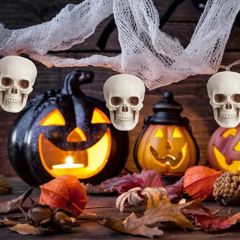 Halloween Home Décor Set of Miniature Plastic Skulls with an Aged Finish