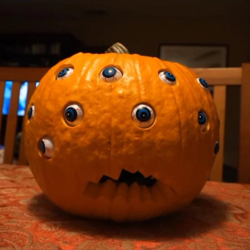Animated Halloween Pumpkin with Moving Eyes and Jagged Mouth Decorations