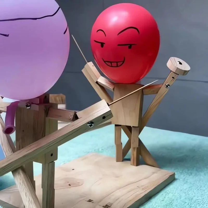 Two-Player Balloon Battle Arcade Game with Wooden Figurines