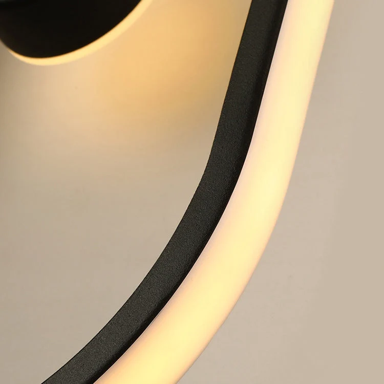 Scandinavian Oval LED Wall Lamp with Clock Motif