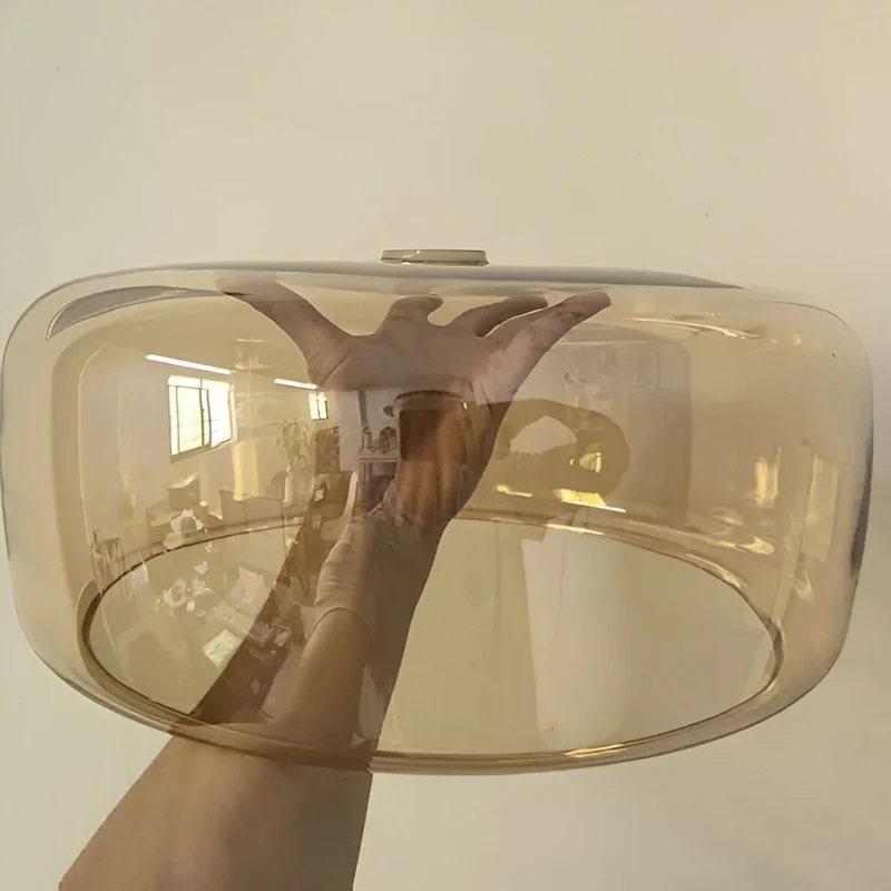 Retro-style ceiling lamp with triple glass shade and adjustable LED lighting