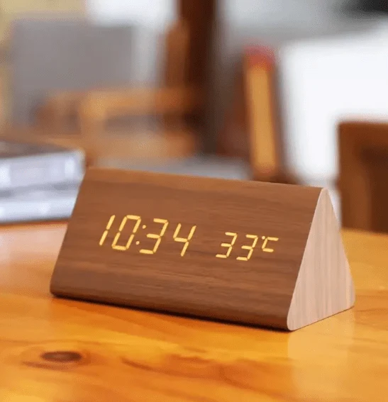 Minimalist wooden LED clock with sound activation for modern homes