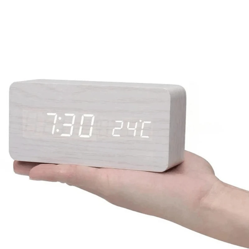 Minimalist wooden LED clock with sound activation for modern homes